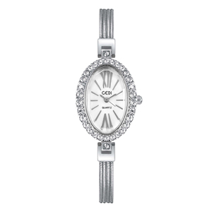 Montre à quartz pour femme, bracelet étanche, petit cadran ovale personnalisé, entièrement sertie de diamants, style luxe léger et tendance - Product Image 1
