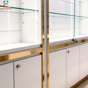 Vitrina de Joyería de Lujo con Acabado Espejo Dorado, Estantes de Vidrio Ajustables e Iluminación LED <span class=keywords><strong>para</strong></span> Muebles de Tienda Minorista de Alta Gama - Product Image 4