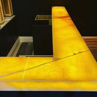 Prix usine design luxe dalle d'onyx jaune naturel panneau transparent pour mur de fond de comptoir de bar