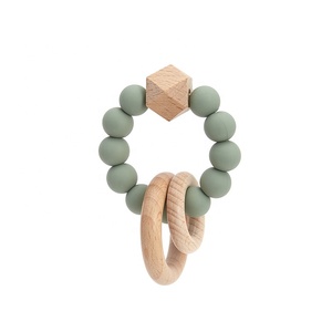Nouveau design anneau de dentition sensoriel pour bébé Hochet en bois doux sans BPA pour bébé - Product Image 1