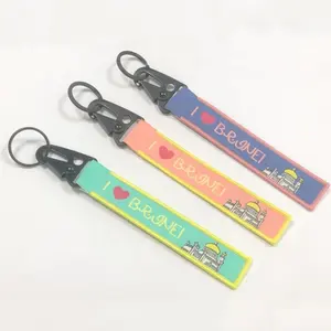 Manufacturer Supply Newly designed embroidered Textile Patch Keychain custom logo Letter Fabric strap keyring