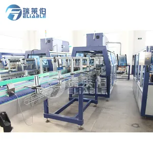 Automatic Carton Packing Machine Water Juice Glass Bottle Hot Melt Glue Wrap Around Carton Case Packer