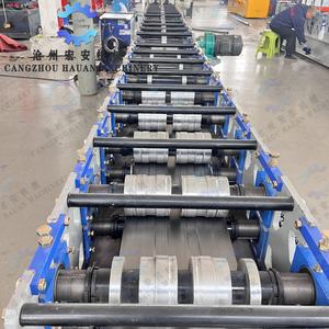 Machine à poutres pour rayonnages d'entrepôt HAUAN avec coupe à la scie volante et soudage laser, contrôlée par PLC, dotée d'un moteur à engrenages et d'un moteur. - Product Image 3