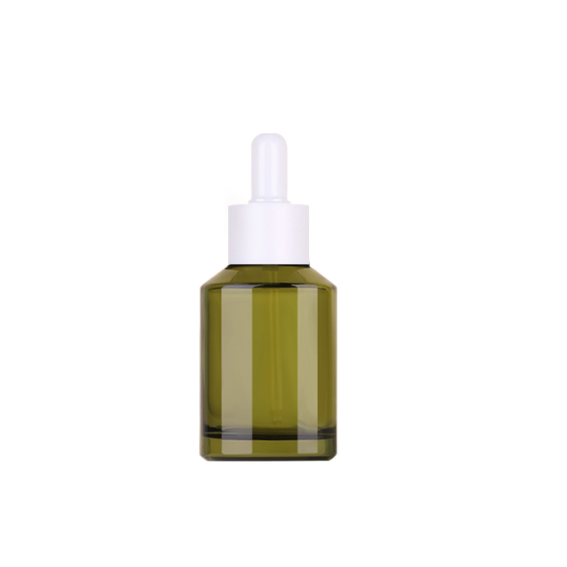Bouteille verte avec tête en caoutchouc blanc
