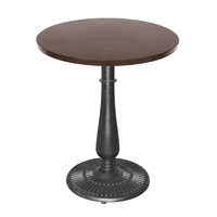 Table d'appoint ronde en bois de style industriel classique, base en fonte sculptée motif soleil pour les aménagements de cafés
