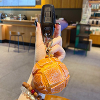 Vente en gros usine Porte-clés pâton carré de simulation, jouet alimentaire de pâtisserie, breloque de sac, porte-clés de voiture