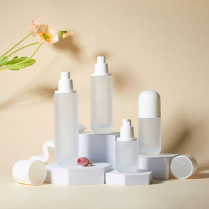 Wholesale 30ml 40ml 60ml 100ml 120ml 1oz 2oz 4oz Round <strong>Empty</strong> Frosted Clear Glass <strong>Spray</strong> Lotion Pump <strong>Bottles</strong> With Round White Cap - Product Image 1