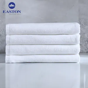 Toptan fiyat beyaz 5 yıldızlı otel banyo havlusu % 100% pamuk lüks otel tedarikçisi düşük MOQ