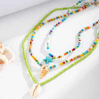 Collier tendance transfrontalier en coquillage et pierre naturelle, style bohème, avec pendentif conque perlée et étoile de mer, chaîne de clavicule