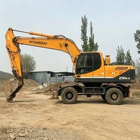 Excavatrice sur pneus Hyundai 210 d'occasion, modèle 2024, très populaire et très demandée, avec moteur Cummins, pompe hydraulique Kawasaki, moteur, engrenage et contrôle PLC