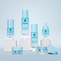 Ensemble de flacons cylindriques vides personnalisés pour soins de la peau, emballage de luxe en verre pour lotion, toner, sérum, huile, avec pompe