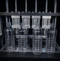 Machine de soufflage de bouteilles PET semi-automatique à 4 cavités, stable et facile à utiliser, pour l'industrie de l'eau potable et de l'alimentation