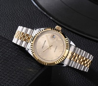 Montre-bracelet de luxe pour femme en acier inoxydable doré à quartz, avec cadran analogique en cristal et breloque, style arabe musulman