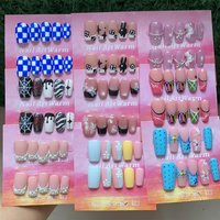 Ongles press-on faits main à couverture complète, fournitures d'onglerie haut de gamme en gros, faux ongles courts avec colle pour filles