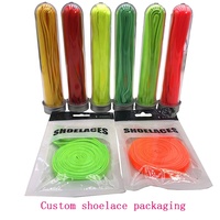 Lacets plats en polyester de couleur unie, lacets de remplacement simples emballés dans des tubes en plastique transparent pour chaussures de sport