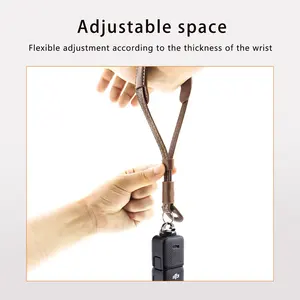 Sangle de poignet en cuir PU KAMPHO pour <span class=keywords><strong>DJI</strong></span> <span class=keywords><strong>Osmo</strong></span> <span class=keywords><strong>Mobile</strong></span> 4 <span class=keywords><strong>3</strong></span> Zhiyun Stabilisateur de poche avec vis 1/4 <span class=keywords><strong>DJI</strong></span> Pocket 2 <span class=keywords><strong>3</strong></span> <span class=keywords><strong>Accessoires</strong></span> - Product Image 5