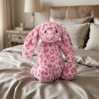 Peluche Lapin Léopard Style JC 30cm avec base lestée, en peluche courte haute densité, oreilles longues, apaisant, avec trois étiquettes et sac