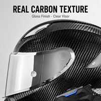 Casque de moto intégral personnalisé OEM avec coque en fibre de carbone brillante, visière transparente et module de communication
