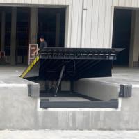 Rampe de déchargement hydraulique Offre Spéciale Hauteur réglable Rampe de conteneur de chariot élévateur de 10 tonnes Pont d'embarquement fixe