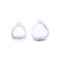 Bouteille de parfum en verre de luxe ronde 30ml 50ml 75ml pour vaporisateur en forme de boule avec noir pour bouchon à bille pour diffuseur et emballage