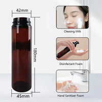 Bouteille à pompe en plastique PET transparent ambré 180ml 200ml 250ml pour savon nettoyant pour le visage avec brosses en silicone