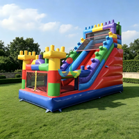 Château gonflable personnalisé coloré à thème briques de construction avec toboggan pour jeux extérieurs et location commerciale