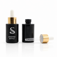 Flacon compte-gouttes en verre noir 30 ml vide pour huiles essentielles et sérums, avec bouchon doré et pompe en caoutchouc blanc, vente en gros, logo personnalisé