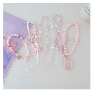 สายคล้องโทรศัพท์มือถือแบบใหม่ สีชมพูสดใส ประดับมุก สายคล้องมือถือถักมือ ใช้ได้กับโทรศัพท์มือถือทุกรุ่น พกพาสะดวก - Product Image 1
