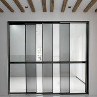 Système parfait Porte coulissante à quatre panneaux ultra-mince Porte de séparation en verre et alliage moderne Convient pour la chambre à coucher, la cuisine et le balcon
