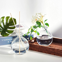 Vente en gros de bouteilles sphériques en verre de 250ml avec des bouteilles de potion rondes en liège décor clair pot sphère en verre décoratif pour sable