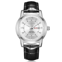 Montre à quartz de qualité supérieure avec cadran multicolore unique, bracelet en cuir antidérapant, fonction lumineuse, idéale comme cadeau souvenir.