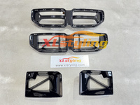 Kit carrosserie en plastique ABS pour BMW G87 M2, comprenant un pare-chocs avant, des jupes latérales, un diffuseur arrière, un aileron, des conduits d'air et une calandre.