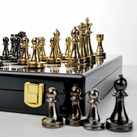 Jeu d'échecs de luxe noir et or, pièces métalliques, plateau pliable à motif marbré, personnalisable OEM, vente en gros