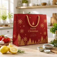 Sac cadeau en papier kraft rouge recyclable personnalisé avec gaufrage en feuille d'or et motif de Noël