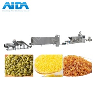 Nouvelle machine extrudeuse à double vis pour riz artificiel, lignes de production automatiques de riz artificiel, machine de fabrication de riz nutritionnel