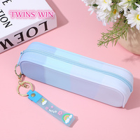 Trousse à crayons rectangulaire pliable populaire en silicone à dégradé de couleurs avec porte-clés mignon, sac à stylos personnalisé pour enfants