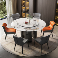 Table à manger ronde moderne avec plateau en pierre frittée et structure métallique réglable, 8 places, design luxueux, construction durable