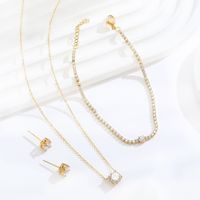 Ensemble de bijoux en zircon classique en acier inoxydable or 18 carats pour femmes boucles d'oreilles et collier pour cadeau d'anniversaire en gros