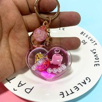 Nouveau porte-clés créatif avec des animaux marins flottants dans de l'huile, porte-clés mignon avec une baleine, un dauphin, un pingouin, un cœur d'amour, du sable mouvant liquide