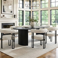 Table à manger ovale moderne 6 places en bois noir au design minimaliste 2026 avec support incurvé pour salle à manger