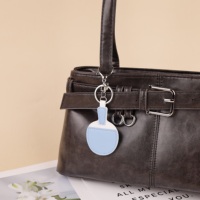 Porte-clés minimaliste en forme de raquette de tennis de table, en cuir PU avec clip métallique, pour sac à main et bagages quotidiens