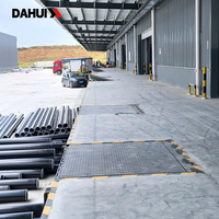 Niveleur de quai hydraulique fixe, plateforme de chargement électrique stationnaire pour la logistique moderne
