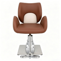 Chaise de coiffeur marron chocolat avec coussin crème, base carrée, élévateur hydraulique pour la coupe de cheveux