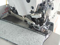 Machine à coudre surjeteuse industrielle à quatre fils RNEX4-4 d'équipement surjeteuse de vêtement en matériau mince