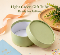 Boîte en tube de papier rigide personnalisée, cylindre rond vert clair, couvercle amovible, emballage en feuille brillante gaufrée pour cosmétiques