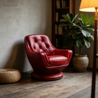 Fauteuil club pivotant de style mid-century moderne en cuir bordeaux capitonné avec base sur piétement pour salon ou bureau