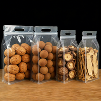 Sac d'emballage alimentaire refermable en plastique transparent brillant à fond plat à huit côtés avec poignée pour les noix