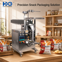 Machine d'emballage automatique de snacks sur convoyeur avec purge d'azote pour la conservation de la fraîcheur et une longue durée de conservation