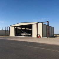 Hangar préfabriqué en acier JINGYI pour opérateur aéroportuaire, base fixe, aviation générale avec hélicoptère, design moderne