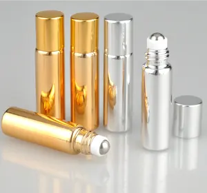 Vendita calda 5ml 10ml rotolo di vetro su bottiglia lucido rivestimento UV rotolo di profumo su bottiglia con tappo in alluminio dorato e sfera di metallo
